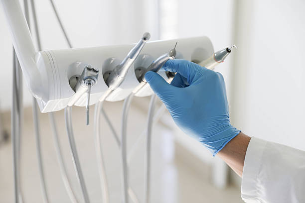 Professional Tooth Extraction technician working in Las Vegas, NM